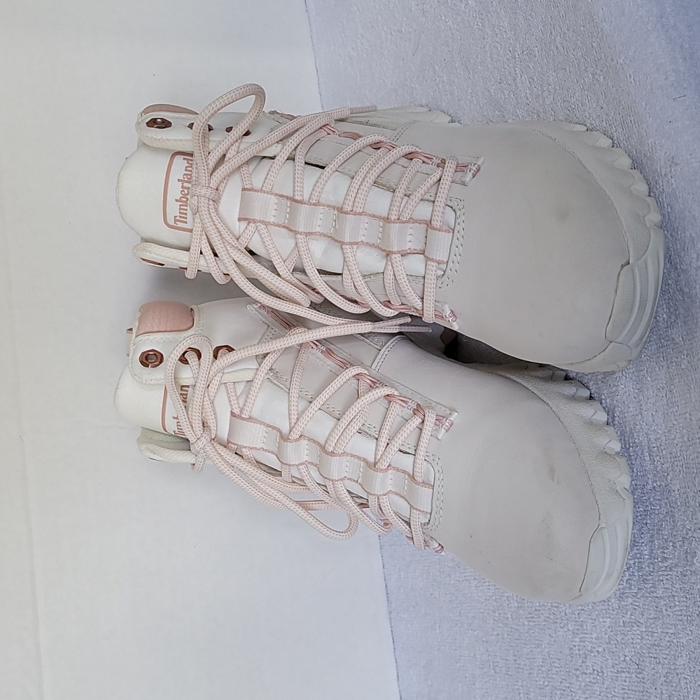Timberland women's size 9 white boots with pink accents